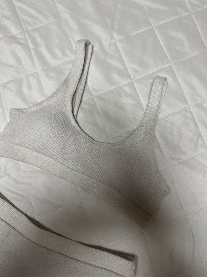 White ribbed bikini set two piece swimwear (Category: Bikinis & Swimsuits) located in Valenzuela. Submitted by prelovedbyramsie (Listing ID 1468419813, Image 3). Description: - Color: White - Material: Ribbed fabric - Design: Minimalist two-piece set - Top: Scoop neck with thick straps - Bottom: High-waisted cut.