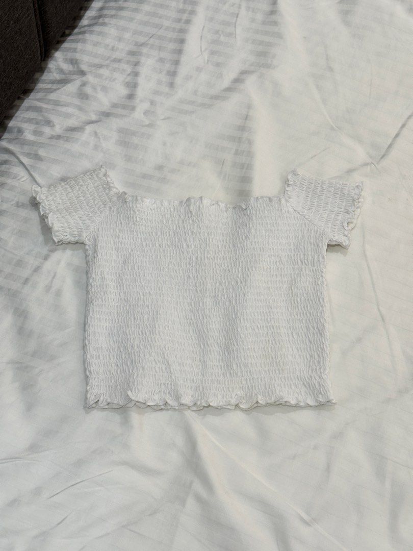 White Smocked Off Shoulder | garter basic hm cotton on (Category: Others Tops) located in Balanga. Submitted by cartsabeli (Listing ID 1468378513, Image 1). Description: Never worn/used. Still in great condition 😊 can fit xs-semi medium ₱300 + sf mop: gcash/maya mod: j&t only.