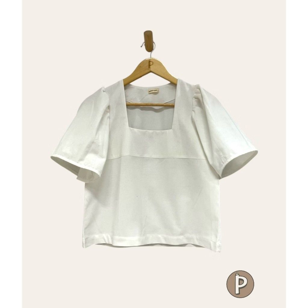 White Square Neck Blouse Puff Sleeves (Category: Blouses) located in Quezon City. Submitted by rightyriko (Listing ID 1468303155, Image 1). Description: - Color: White - Neckline: Square neck - Sleeves: Short puff sleeves - Size: Medium - Condition: Good, worn a few times and freshly washed - Styling: Easy to pair with denim jeans or skirts - RFS: A bit big for me .