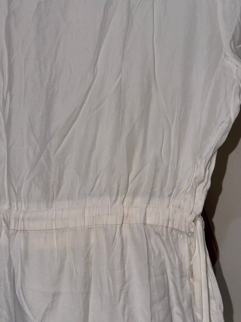 White tiered midi dress with drawstring waist (Category: Dresses) located in Taguig. Submitted by deguzmanke83356 (Listing ID 1468344343, Image 2). Description: - Color: White - Style: Casual midi dress - Details: Short sleeves, rounded neckline, adjustable drawstring waist - Design: Multi-panel tiered skirt - Fabric: Lightweight (note: has some wrinkling from storage) - Perfect for warm weather days!.