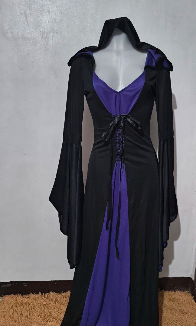 Witch/ Vampire/Ghotic/ Medieval Costume (Category: Dresses) located in Marikina City. Submitted by alecfordy (Listing ID 1468398763, Image 1). Description: Witch/Vampire/Gothic) Medieval Halloween Costume Medium Body adjustable front 17 inches shoulder 18 inches width 54 inches length.