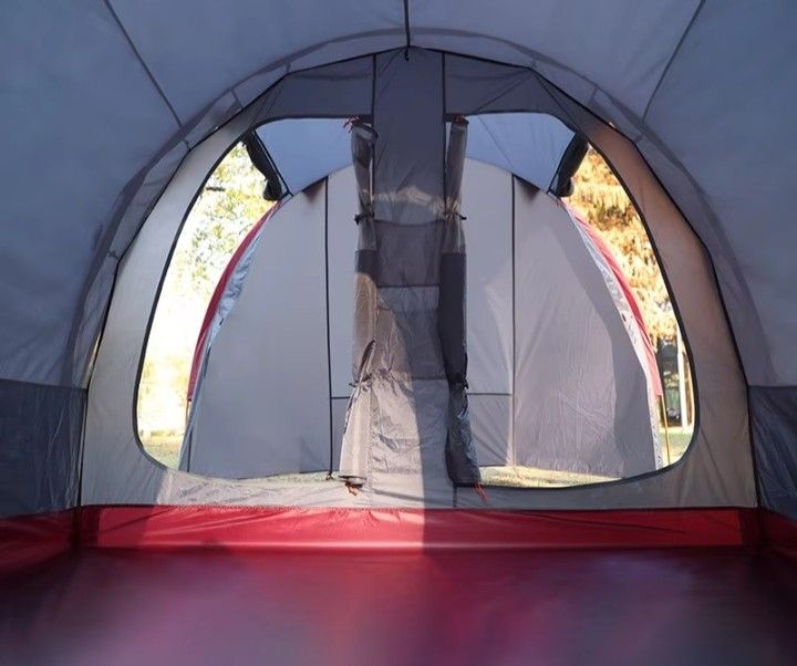 Wolf Walker Camping Tent Multi-Room Grey Red (Category: Hiking & Camping) located in Abucay. Submitted by cristineca20489 (Listing ID 1468342296, Image 2). Description: - Brand/Model: Wolf Walker camping tent - Color: Grey and red - Layout: Multi-room with separate sleeping and living areas - Ventilation: Mesh windows for airflow - Setup: Easy assembly, perfect for weekend trips - Includes: Compact carrying bag, poles, and stakes - Condition: Cle