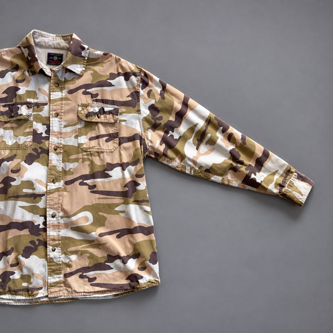 WRANGLER CAMO LONG-SLEEVE POLO (Category: Tshirts & Polo Shirts ) located in Taguig. Submitted by clarrk95 (Listing ID 1468452519, Image 2). Description: Wrangler Camo Long-Sleeve Polo Size: faded size tag Length: 31inches Width: 25inches Sleeve: 19inches PRICE: ₱400 ONLY! ✅ very good condition ✅ add shipping fee ✅ ignoring LP inquiry Shipping: Lalamove | J&T | LBC Location: Taguig📍 Payment: Gcash | Bank | Cash FB: THRFT IG: thrft_25 DM for more