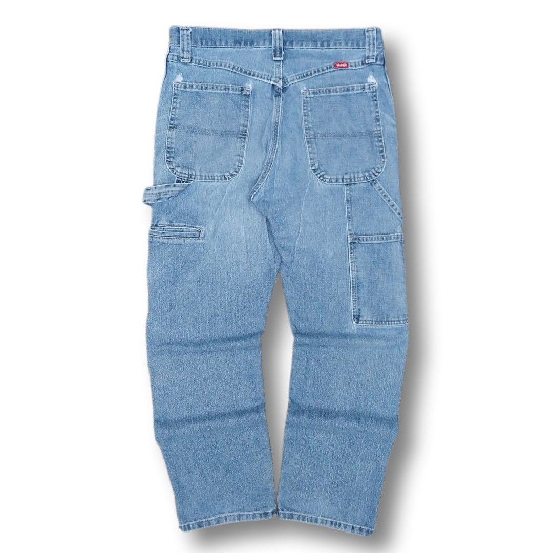 Wrangler Carpenter Denim Jeans Light Wash (Category: Jeans) located in Cavite. Submitted by spinfits (Listing ID 1468290509, Image 2). Description: - Brand/Model: Wrangler carpenter denim jeans - Wash: Light blue with a great vintage fade - Fit: Relaxed fit with a straight leg cut - Features: Side utility pockets, hammer loop, and durable stitching - Details: Iconic red Wrangler logo tag on the back pocket - Condition/Style: Sturdy fabric, ideal 