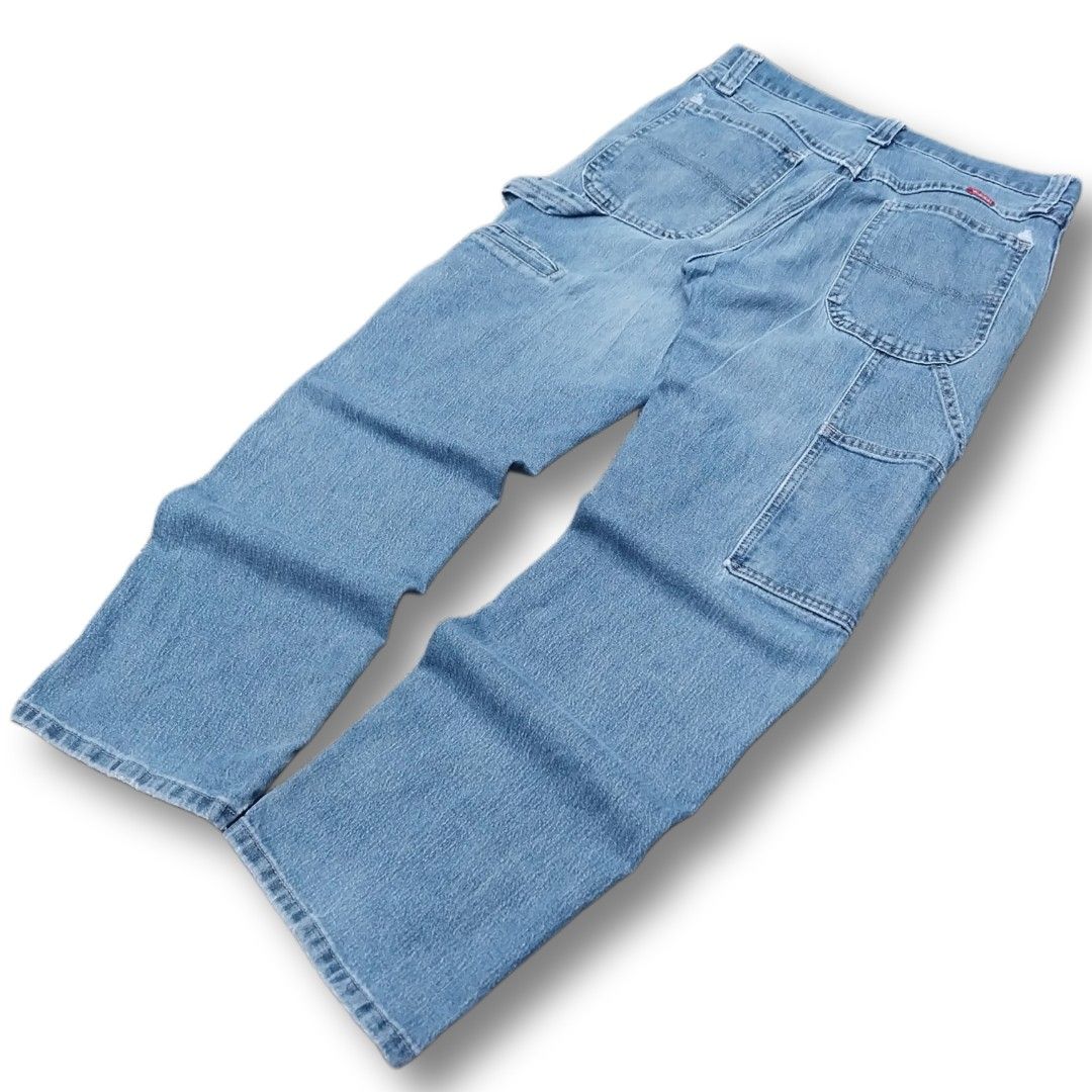 Wrangler Carpenter Denim Jeans Light Wash (Category: Jeans) located in Cavite. Submitted by spinfits (Listing ID 1468290509, Image 3). Description: - Brand/Model: Wrangler carpenter denim jeans - Wash: Light blue with a great vintage fade - Fit: Relaxed fit with a straight leg cut - Features: Side utility pockets, hammer loop, and durable stitching - Details: Iconic red Wrangler logo tag on the back pocket - Condition/Style: Sturdy fabric, ideal 