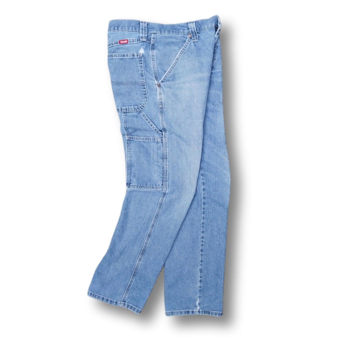 Wrangler Carpenter Denim Jeans Light Wash (Category: Jeans) located in Cavite. Submitted by spinfits (Listing ID 1468290509, Image 1). Description: - Brand/Model: Wrangler carpenter denim jeans - Wash: Light blue with a great vintage fade - Fit: Relaxed fit with a straight leg cut - Features: Side utility pockets, hammer loop, and durable stitching - Details: Iconic red Wrangler logo tag on the back pocket - Condition/Style: Sturdy fabric, ideal 