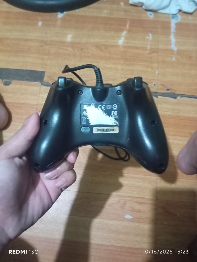 Xbox 360 Wired Controller Black (Category: Controllers) located in Caloocan City. Submitted by oddfish.7816e8 (Listing ID 1468323862, Image 2). Description: - Compatible with Xbox 360 and PC - Fully functional buttons, triggers, and D-pad - Includes untangled cord - Heavy wear on thumbsticks with peeling rubber - Cleaned and ready to use for retro gaming setups -RB is not clicking anymore I hope you see this flaw.