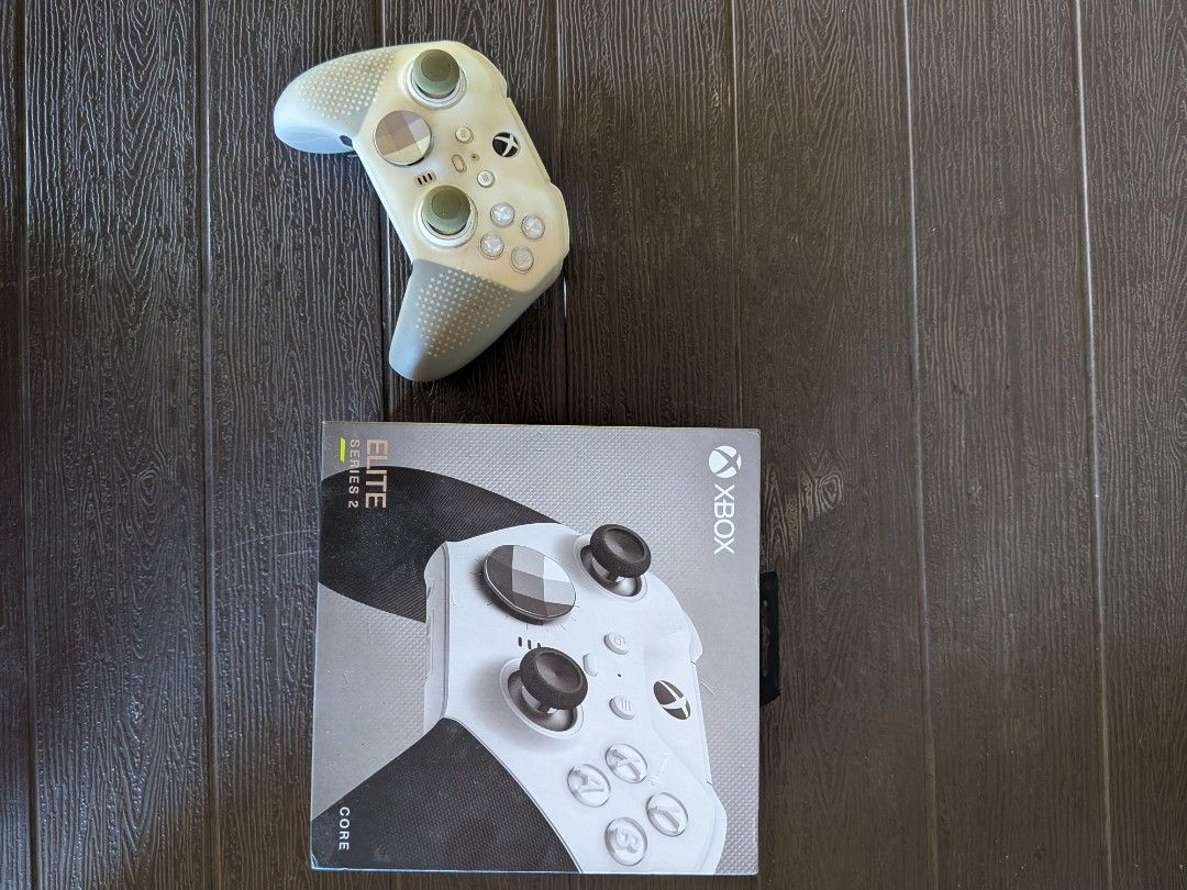 Xbox Elite Wireless Controller Series 2 Core White (Category: Controllers) located in San Jacinto. Submitted by jigssaw (Listing ID 1468317510, Image 1). Description: - Authentic Xbox Elite Wireless Controller Series 2 Core (White) - Condition: Fully functional and ready for gaming - Includes: Original retail box, customizable thumbsticks, and rear paddle slots - Added Protection: Includes protective silicone skin on the grips - Key Features: USB