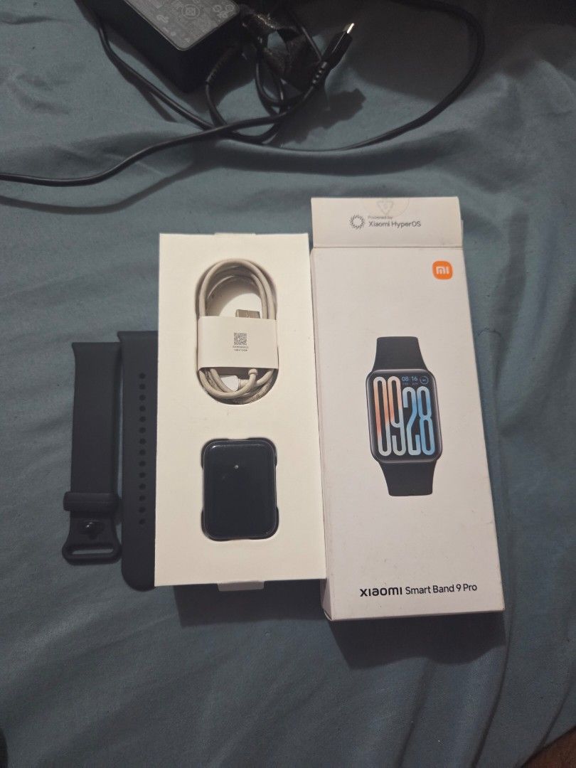 Xiaomi Smart Band 9 pro (Category: Wearables & Smart Watches) located in Caloocan City. Submitted by rmnsgbriii (Listing ID 1468358800, Image 1). Description: purchased November 2025 at Mi store in Trinoma - Brand/Model: Xiaomi Smart Band 9 Pro - Operating System: Powered by Xiaomi HyperOS - Color: Classic Black - Condition: Excellent, lightly used - Inclusions: Original box, tracker unit, charging cable, and black strap - Meetup Location: San Pe