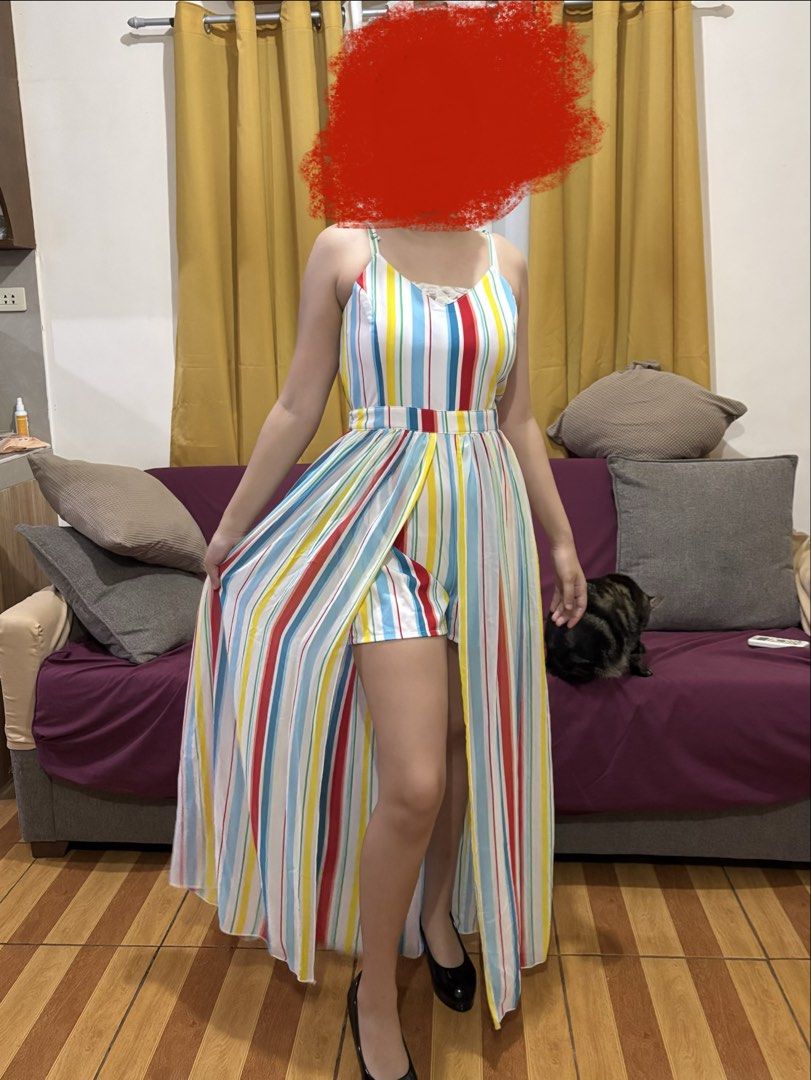 XOXO Striped Romper with Overlay Size L (Category: Rompers) located in Subic. Submitted by kai000. (Listing ID 1468404849, Image 2). Description: Only used once❗️ - Brand: XOXO - Size: L (tag attached) - Design: Multicolor striped summer romper with a sheer overlay skirt (dress effect) - Details: Spaghetti straps, V-neckline with white lace trim, and back zip closure - Fabric: Lightweight and bright, ideal for sunny days and outings.