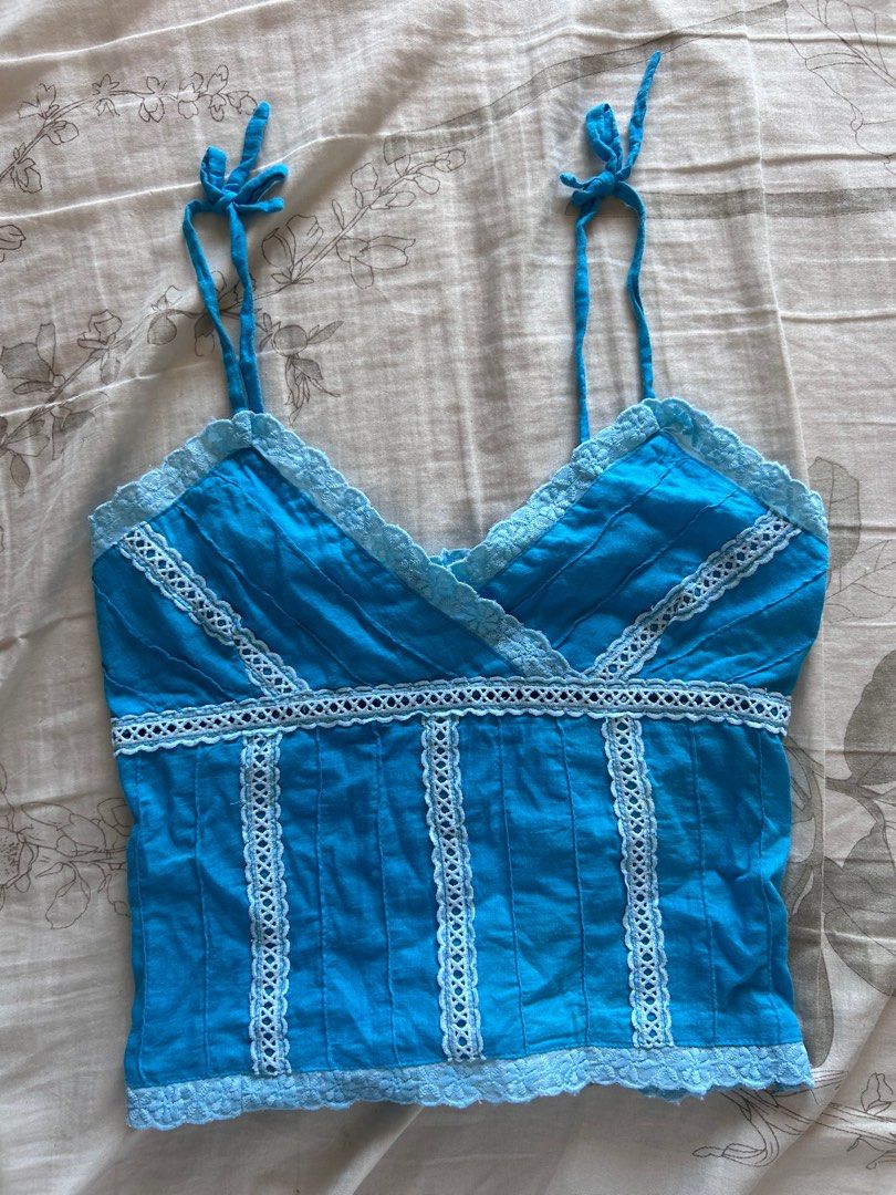 Y2K blue camisole cami (Category: Sleeveless) located in Taguig. Submitted by lovedby_flora (Listing ID 1468392377, Image 1). Description: No when worn Waistline: 24-26” Best fits xs frames.