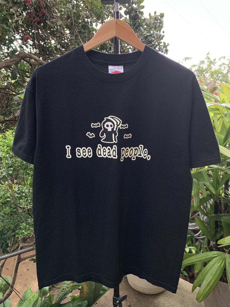 Y2K Grim reaper statement tee (Category: Tshirts & Polo Shirts ) located in Cagayan de Oro. Submitted by premium_thrifts (Listing ID 1468403810, Image 2). Description: Black colorway. Excellent condition. Glow in the dark Double stitch on both sleeves and hem Fits Large L27.8" x W21" 20" (shoulder to shoulder) 7.5" (sleeve length) Issue: none Add shipping fee (via JRS or J&T).