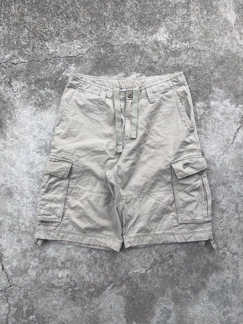 Y2K Nike khaki cargo shorts (Category: Shorts) located in M'Lang. Submitted by sourcevtg_thrft (Listing ID 1468340328, Image 1). Description: - As new condition - Khaki colorway - No issue - Embroidered nike logo - Dimension: 32Waist x 22Length.