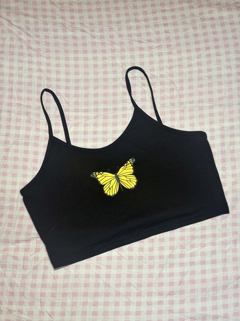 Y2K Vibes Butterfly Tank Top (Category: Sleeveless) located in San Juan City. Submitted by angel_aura_archive (Listing ID 1468341560, Image 1). Description: - Free size (S-L) - All of the details are here n po so pls matuto po magbasa and no to low bailers!! I can give discount if marami po kukunin. They are not from ukay and they are from my personal collection from my closet (purpose is to declutter)..