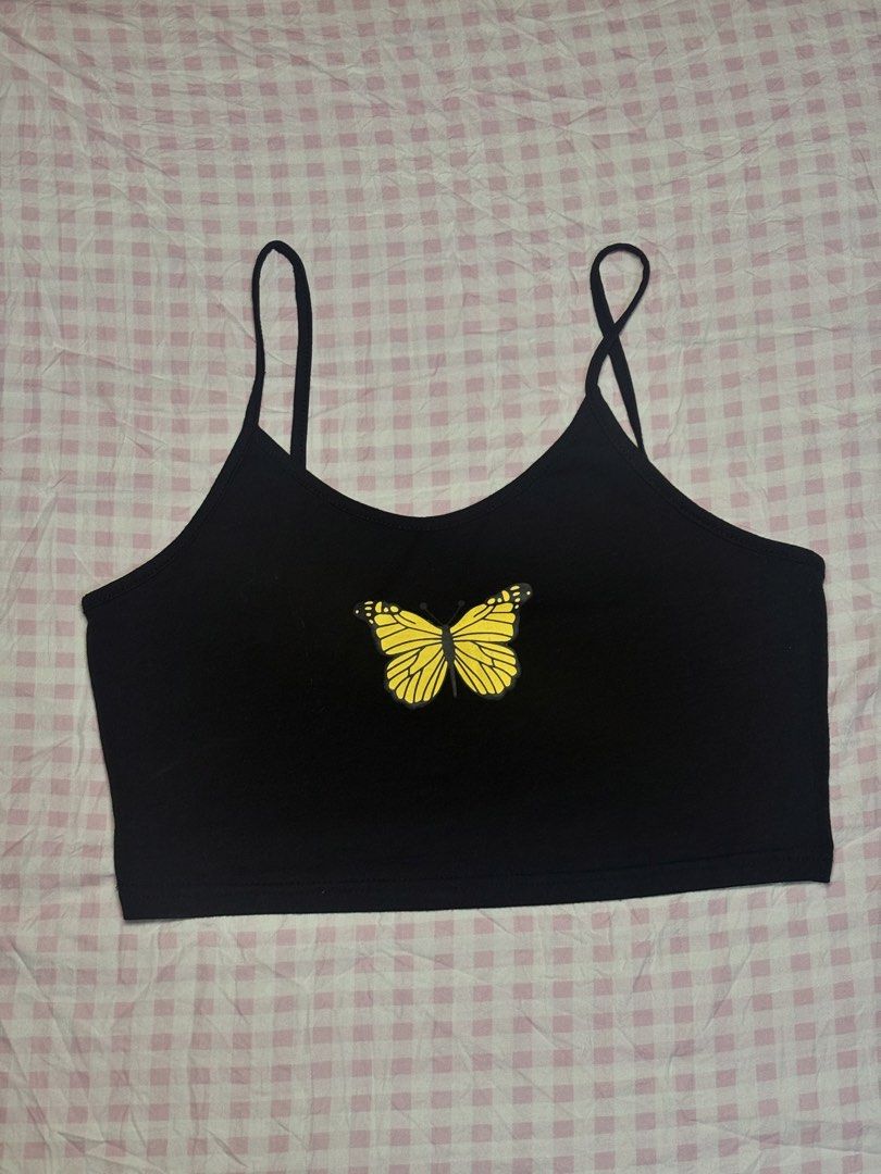 Y2K Vibes Butterfly Tank Top (Category: Sleeveless) located in San Juan City. Submitted by angel_aura_archive (Listing ID 1468341560, Image 2). Description: - Free size (S-L) - All of the details are here n po so pls matuto po magbasa and no to low bailers!! I can give discount if marami po kukunin. They are not from ukay and they are from my personal collection from my closet (purpose is to declutter)..