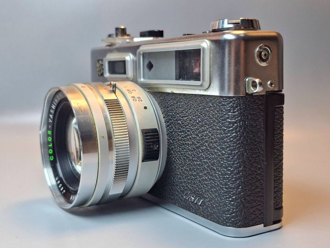 Yashica Electro 35 GSN Rangefinder Camera (Category: Cameras) located in Paranaque City. Submitted by lexajapansurplus (Listing ID 1468353490, Image 3). Description: 📸 Vintage Yashica Electro 35 GSN 35mm Rangefinder Camera with Color-Yashinon DX 45mm f/1.7 Lens 📌 Cosmetically in clean vintage condition. 📌 Film chamber and pressure plate are clean. 📌 Untested with battery/film. 📌 Mechanical functions like shutter release, film advance, and ap