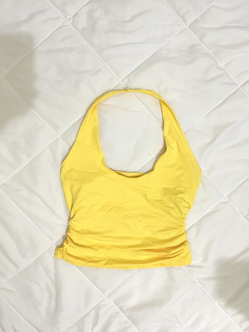 Yellow Halter Ruched side Top (Category: Sleeveless) located in Marikina City. Submitted by eloxade.ee (Listing ID 1468452844, Image 1). Description: 🪞m-l 🏷️ mine 110 10/10! .