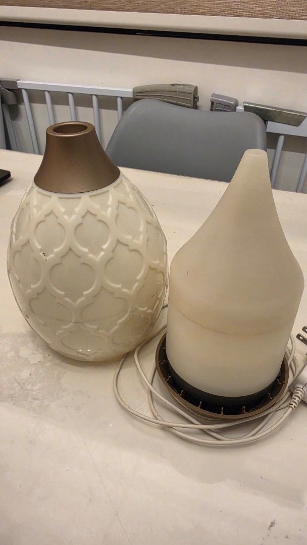 Young Living Desert Mist Diffuser (Category: Home Fragrance) located in Las Pinas. Submitted by sixtosengson (Listing ID 1468426539, Image 2). Description: - Ceramic essential oil diffuser with stylish geometric pattern - Cream and beige colorway with elegant gold-tone top nozzle - Functions as an aromatherapy diffuser and humidifier for small spaces - Includes internal water tank reservoir and original power adapter plug - Clean condition, fully