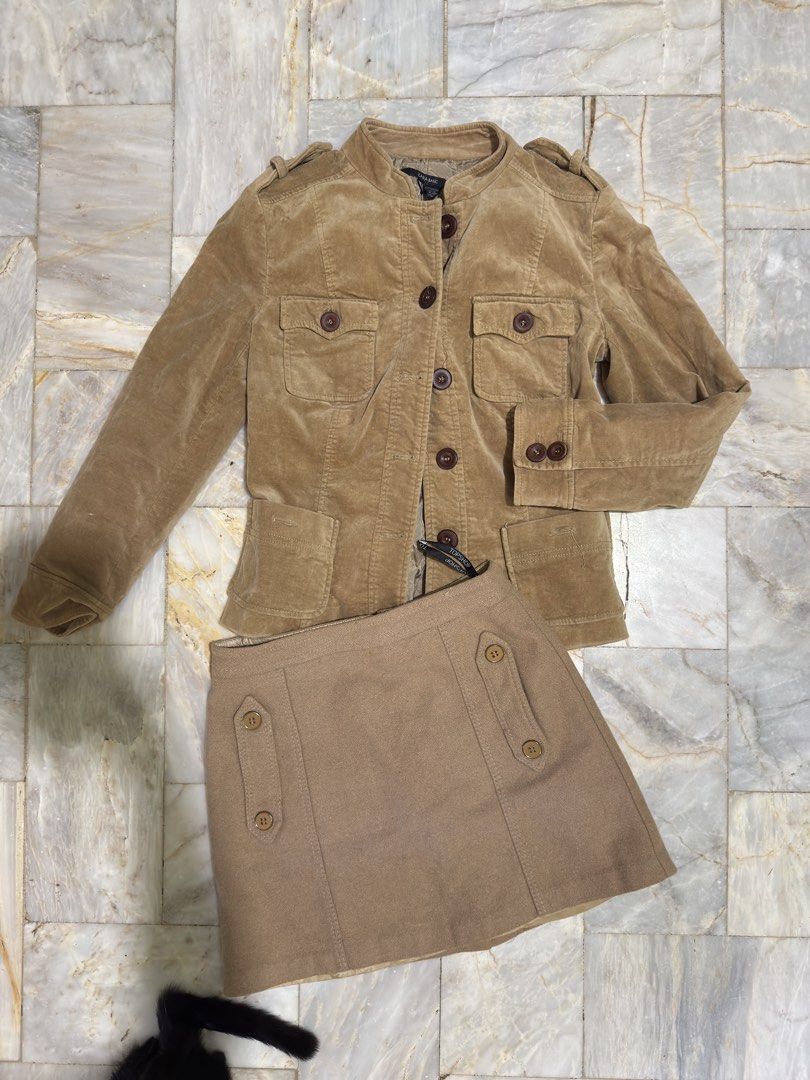 Zara Basic jacket and Topshop skirt set brown (Category: Coats, Jackets and Outerwear) located in Pozorrubio. Submitted by christajoi79316 (Listing ID 1468345044, Image 2). Description: - Brand/Item 1: Zara Basic brown corduroy jacket with utility pockets, shoulder epaulets, and brown buttons - Brand/Item 2: Topshop wool-blend mini skirt with button-detailed front panels and A-line cut - Color: Warm neutral tone, ideal for autumn weather - Condit