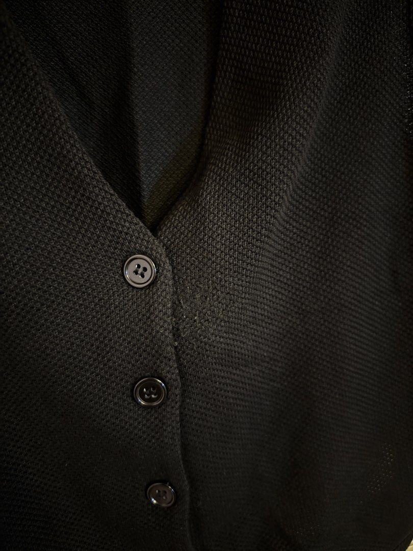 Zara Black Button-Up Vest Size M (Category: Sleeveless) located in Manila. Submitted by gabwie (Listing ID 1468409950, Image 3). Description: - Brand: Zara - Size: M (Standard fit) - Color: Black - Material: Textured knit fabric - Design: V-neckline with 4 black front buttons - Condition: minimal damage near buttons.
