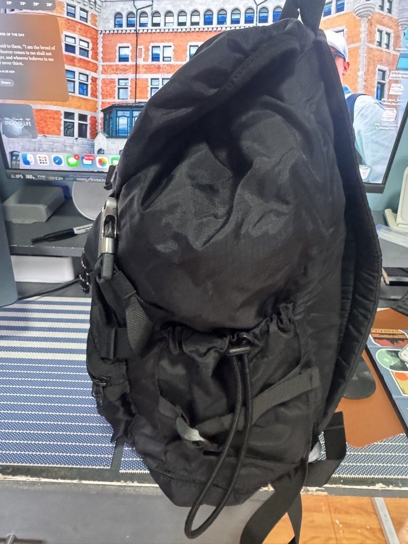 Zara Black Nylon Explorer Backpack (Category: Backpacks) located in Legazpi City. Submitted by mechan88 (Listing ID 1468293044, Image 3). Description: - Color/Material: Durable black nylon - Closure: Drawstring top with crisscross buckle straps - Pockets: Front zippered pocket with a decorative black & white cord, plus adjustable side pockets - Comfort: Padded shoulder straps and convenient top grab handle - Condition: Impeccably clean exterior a