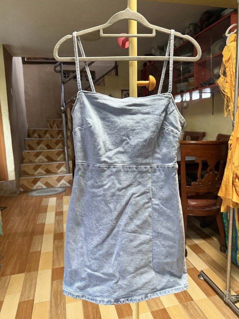 Zara Denim Mini Dress Size S (Category: Dresses) located in Cebu City. Submitted by hotchkisscebu (Listing ID 1468342610, Image 1). Description: - Brand: Zara - Condition: Brand new with tags, never worn - Size: S (EUR S, USA S, MEX 26) - Color/Style: Light wash denim mini dress with spaghetti straps and square neckline - Fit: Fitted silhouette with front panel details - Closure: Smocked elastic back panel with a side zipper - Origin: Made in Ban