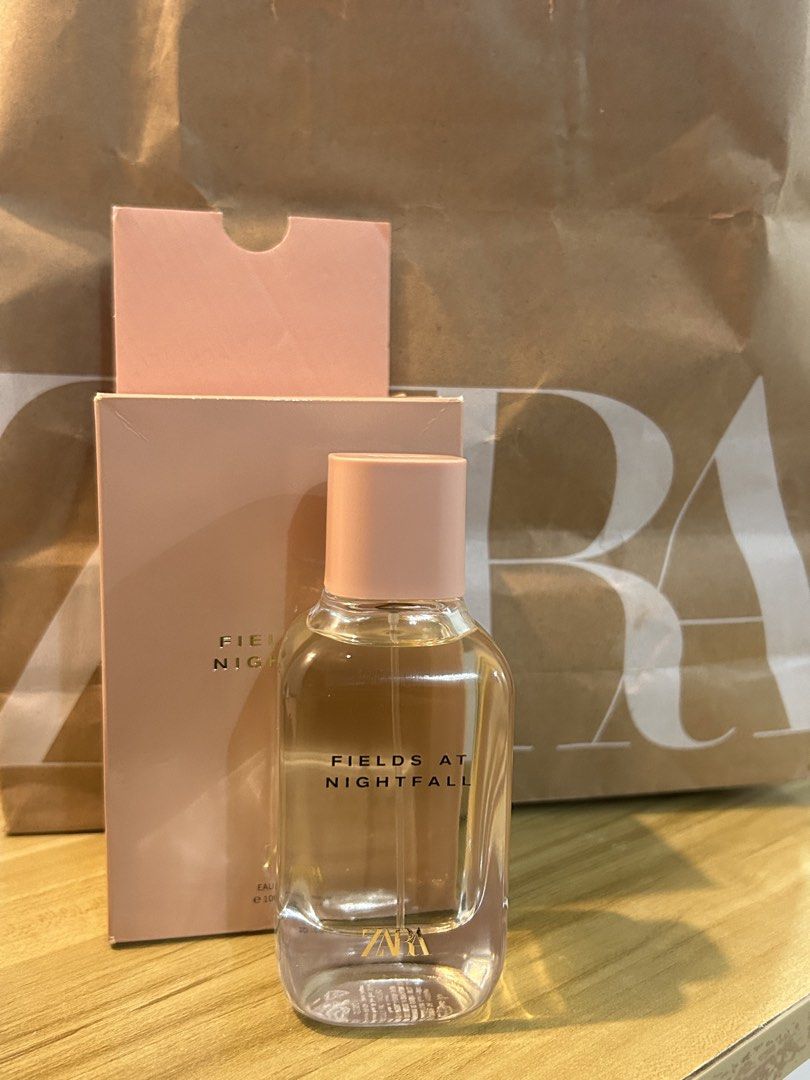 Zara Fields At Nightfall Eau De Parfum 100ml (Category: Fragrance & Deodorants) located in Cavite. Submitted by lovedbysheee (Listing ID 1468294187, Image 1). Description: - Authentic Zara Fields At Nightfall fragrance (100ml) - Condition: Sprayed 1-2 times to test, practically brand new - Scent profile: Warm amber and floral notes, ideal for daily use - Inclusions: Matching pink box and original paper bag - RFS: Decluttering unused perfumes.
