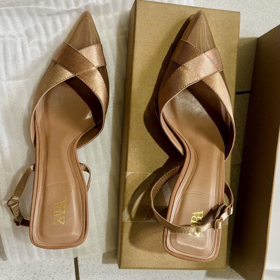 Zara Gold Slingback Heels Size 35 (Category: Heels) located in Manila. Submitted by kbcarousel (Listing ID 1468332539, Image 3). Description: ZARA MESH SLINGBACK HEELS SIZE 35 Color Beige ✨Heeled slingback pumps. Pointed toe. ✨Adjustable back strap with elastic piece. ✨Heel height: 2.4 inches (6 cm) ✨AIRFIT®. Flexible technical sole made of latex foam designed to offer increased comfort. Used once only 💗 Meet up or pick up Location: Sampaloc, Ma