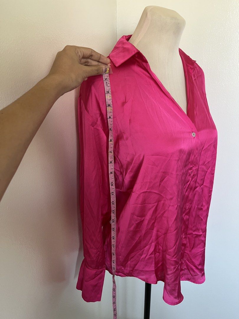 Zara Hot Pink Satin Button-Up Shirt (Category: Blouses) located in Mandaluyong City. Submitted by bravedeer.020ad7 (Listing ID 1468367478, Image 2). Description: - Brand: Zara - Style: Bright hot pink satin blouse - Size: XS (Europe, US, Mexico) - Details: Collared neckline, front button closure, long sleeves with button cuffs, relaxed fit - Material: Lightweight fabric with a slight sheen - Origin: Made in Turkey - Condition: Excellent.