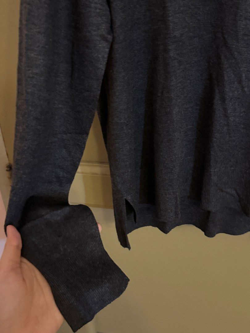 Zara Knit Dark Grey Sweater Size S (Category: Longsleeves) located in Manila. Submitted by gabwie (Listing ID 1468411445, Image 2). Description: - Brand: Zara - Color: Dark Grey - Size: Small (S) - Material: Comfortable knit fabric (light material) - Style: Crewneck, long sleeves, ribbed cuffs and hem - Condition: small hole (see photos) - Perfect for layering and everyday wear.