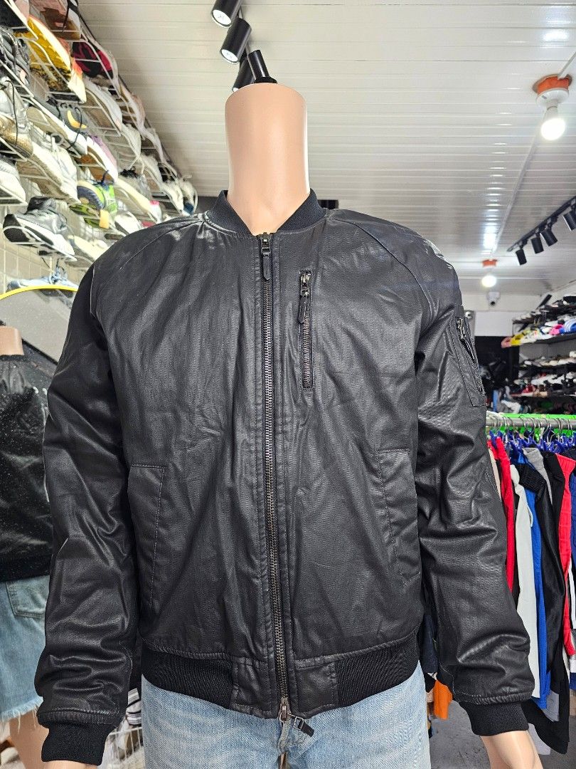 Zara Man Bomber Jacket (Category: Coats, Jackets and Outerwear) located in Baguio. Submitted by kayeonlineshop (Listing ID 1468302535, Image 2). Description: features a classic bomber silhouette with a full-zip front closure, a ribbed knit collar, matching ribbed cuffs, and a ribbed hem.