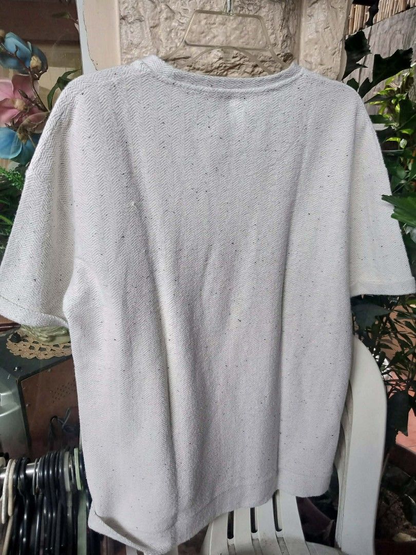 Zara shirt oversized textured knit tee (Category: Shirts) located in Pasig City. Submitted by rjkfindsofficial (Listing ID 1468352198, Image 3). Description: - Brand: ZARA - Color: Cream with black speckled details - Size: EUR M / USA M / MEX 40 - Material: 74% cotton blend (Made in Turkey) - Fit: Relaxed fit with crew neck and rolled sleeve cuffs - Condition: Wash tag clearly attached - ​Minimal signs of usage / smooth pre-loved condition (no ho