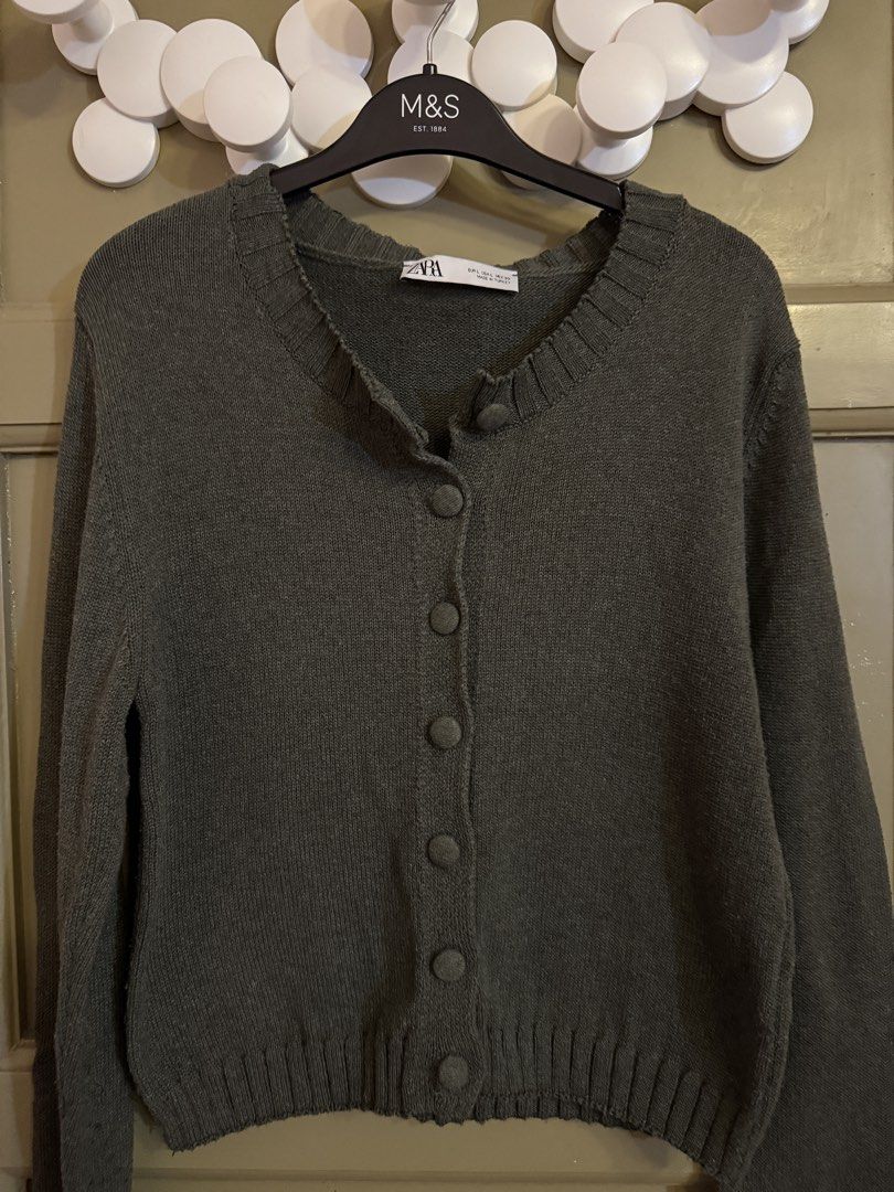 Zara Olive Green Cardigan Top (Category: Coats, Jackets and Outerwear) located in Manila. Submitted by gabwie (Listing ID 1468412845, Image 3). Description: - Brand: Zara - Bought from Zara Glorietta for 3495 - Color: Olive Green - Size: Large - Material: Soft knit - Features: Button-down front with matching fabric buttons, ribbed collar, cuffs, and hem - USED ONCE.