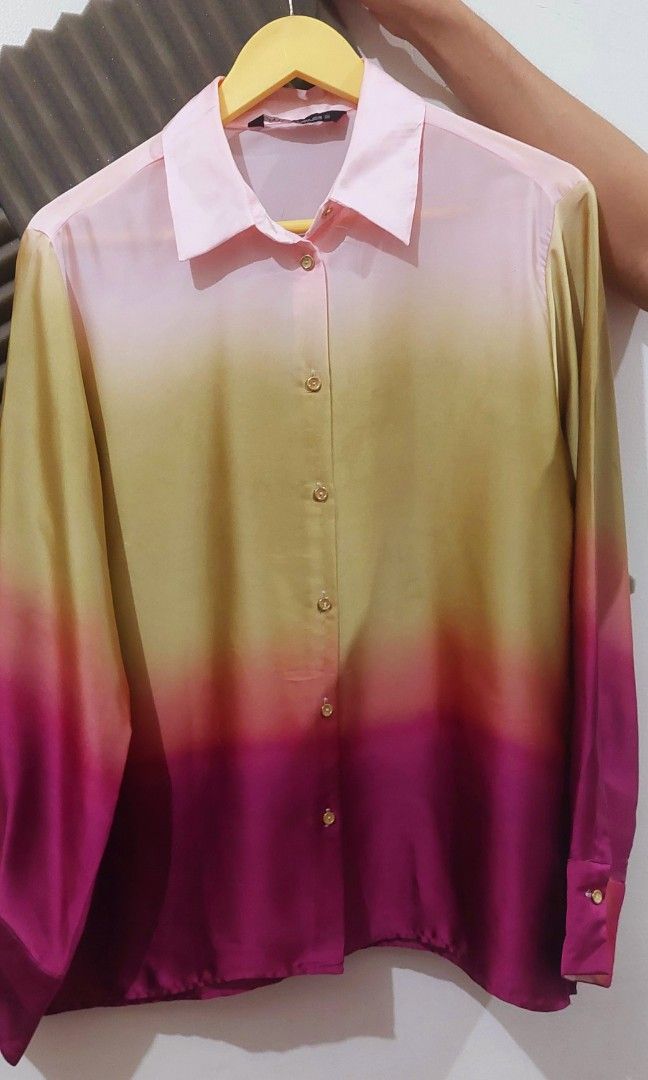 Zara Ombre Long Sleeve Button Down Shirt (Category: Longsleeves) located in Makati City. Submitted by heinzly (Listing ID 1468461626, Image 2). Description: - Brand: Zara - Style: Ombre button-down shirt with front button closure and collared neckline - Colorway: Gradient shifting from pale pink to yellow and deep magenta at the hem and cuffs - Size: EUR S, USA S, MEX 26 - Origin: Made in Morocco.