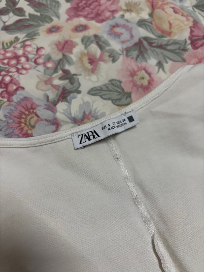 Zara White Crop Top Size S (Category: Sleeveless) located in Manila. Submitted by urthrifthany (Listing ID 1468450469, Image 2). Description: - Brand: Zara - Size: S (Made in Portugal) - Color: White - Fit: Short boxy cut - Details: Simple round neckline and cap sleeves - Material: Thick stretch fabric - Styling: Pairs great with high-waisted denim or skirts.