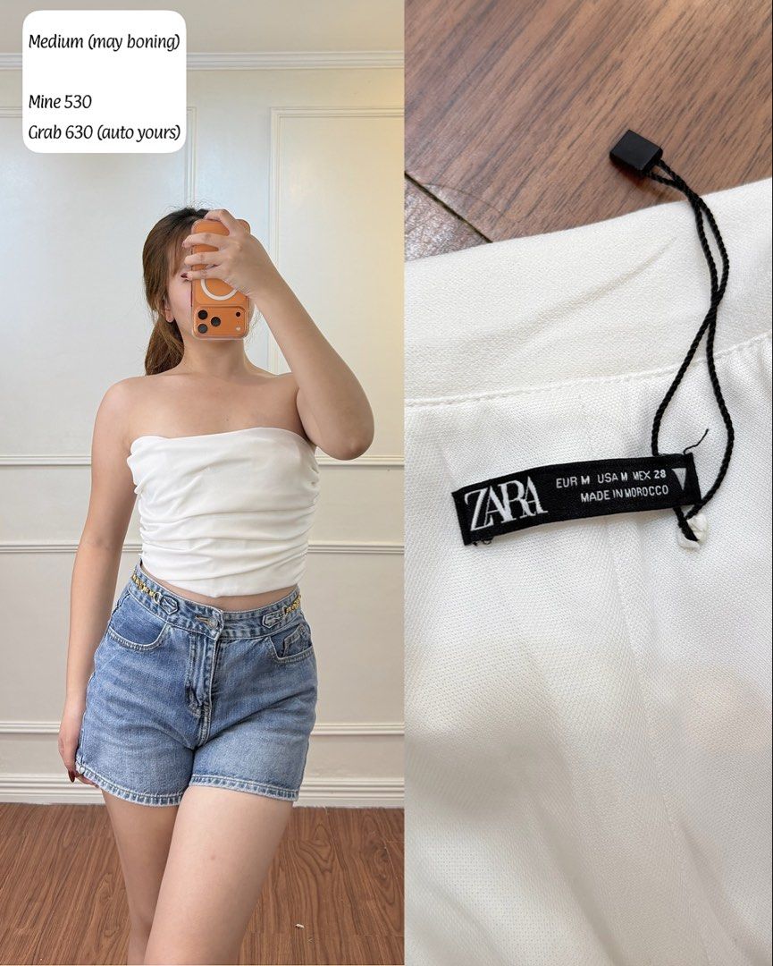 Zara White Tube Top (Category: Sleeveless) located in Manila. Submitted by angelll0123 (Listing ID 1468448347, Image 1). Description: - Brand: Zara - Size: M - Made in: Morocco - Color: Clean white - Features: Interior boning for structure and support, ruched front fabric - Condition: Great, versatile for any bottoms.