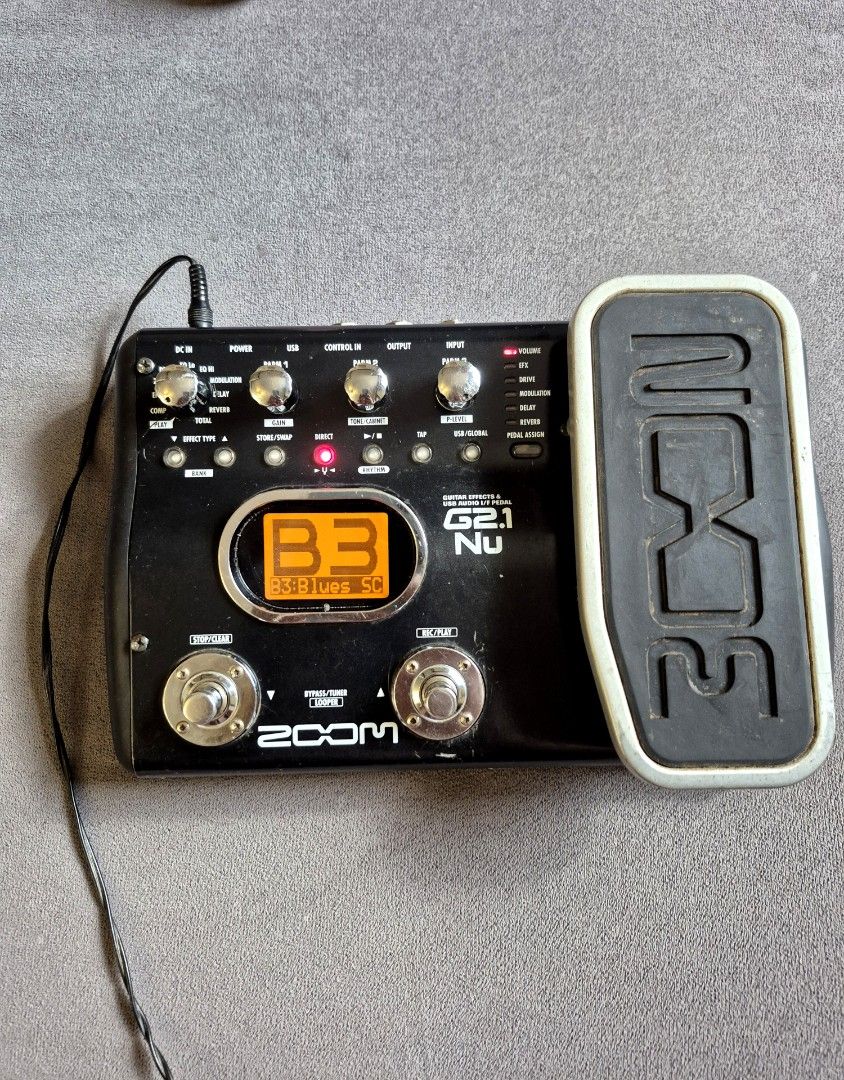 Zoom G2.1Nu Guitar Multi-Effects Processor (with Free Bag) (Category: Musical Instruments) located in Manila. Submitted by awadennver (Listing ID 1468464432, Image 2). Description: ₱2,800 📍Location: Tagaytay City / Cavite (Pickup or Lalamove at buyer's expense) • Includes FREE padded Jansport bag and 9V power supply • Pre-loaded with well-crafted, gig-ready custom patches (from clean to rock tones) • All footswitches, pedal, and jacks are 100% w