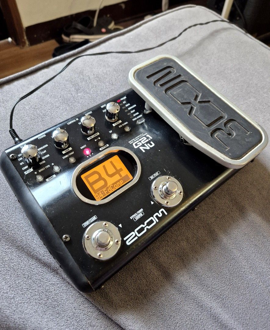 Zoom G2.1Nu Guitar Multi-Effects Processor (with Free Bag) (Category: Musical Instruments) located in Manila. Submitted by awadennver (Listing ID 1468464432, Image 1). Description: ₱2,800 📍Location: Tagaytay City / Cavite (Pickup or Lalamove at buyer's expense) • Includes FREE padded Jansport bag and 9V power supply • Pre-loaded with well-crafted, gig-ready custom patches (from clean to rock tones) • All footswitches, pedal, and jacks are 100% w