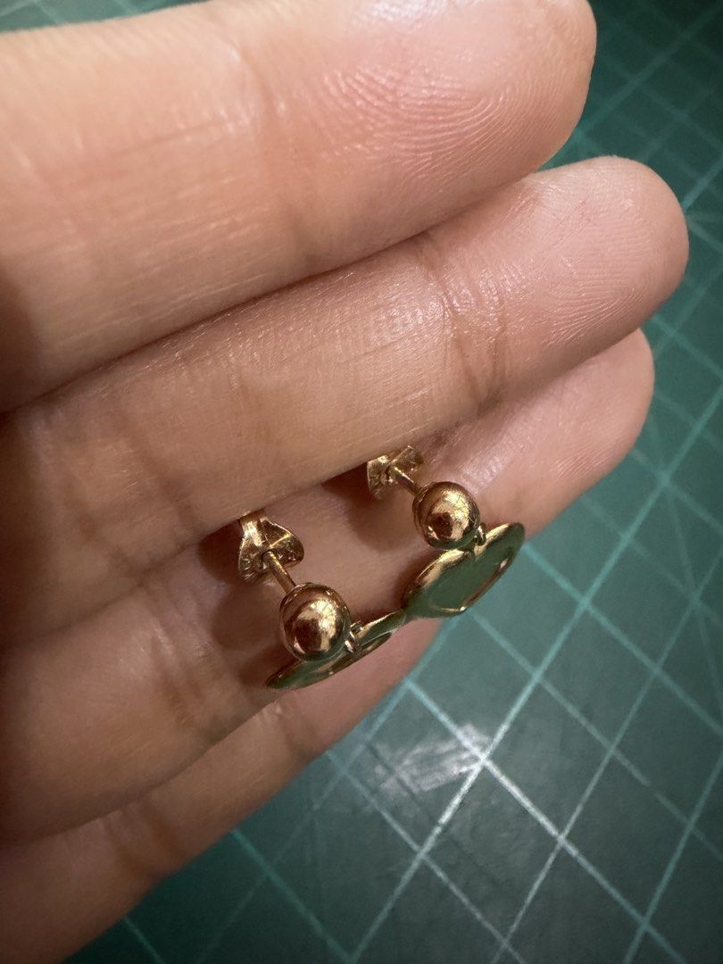 10k 5%gold filled Heart Dangle Stud Earrings (Category: Earrings) located in Caloocan City. Submitted by emz.collection (Listing ID 1468541199, Image 3). Description: - Gold-tone finish with sweet dangling heart charms - Ball stud design with secure post-back closure - Double-layered heart outline with a smooth center Pde sa bata matanda - Lightweight and easy to style for everyday wear - Clean condition with no major scratches or tarnishing.