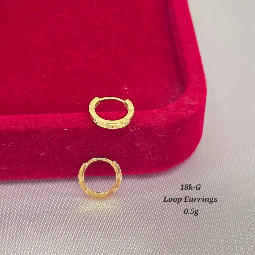 18k Gold Loop Earrings 0.5g (Category: Earrings) located in Marikina City. Submitted by emmstaule (Listing ID 1468582837, Image 1). Description: - Material: Genuine 18k gold - Weight: 0.5g total - Design: Small hoop style with a convenient hinged closure for effortless daily wear - Detail: Elegant engraved markings around the band - Condition: Clean and well-stored.