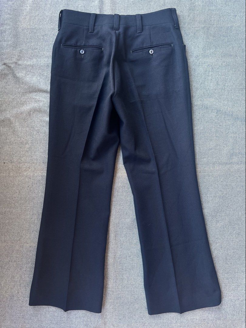 1970s Flared / Boot Cut Navy Slacks Trouser Pants (Category: Trousers) located in Manila. Submitted by minsanseller_madalasbuyer (Listing ID 1468638852, Image 2). Description: 1970s Flared / Boot Cut Navy Slacks Waist - 31” Length - 39” Front rise - 11.5” Hem - 10 - Rip stop, permanent press fabric. - Scovill zipper hardware. - No labels or branding inside. - Can take when styled photos upon request if really interested. ₱ 690.