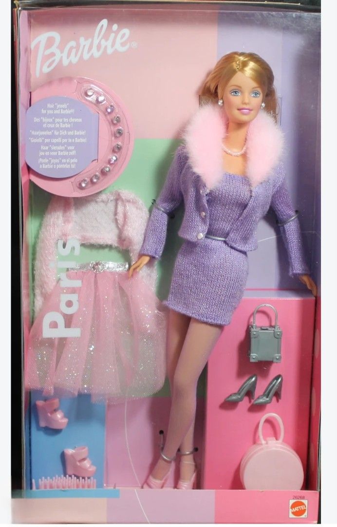 1999 Barbie Paris (Category: Kids Toys) located in Pasig City. Submitted by temerity_16 (Listing ID 1468602571, Image 1). Description: Includes OG accesories - pink handbag -silver handbag - 2 pairs of shoes -1 pink top -1 tutu skirt -hair jewels -pair of earrings -ring -necklace No box Missing silver shoes Super mint condition. Parang fresh from the box. But this was unboxed decades ago. But still, super nice pa ng doll, outfit, and accesories. 