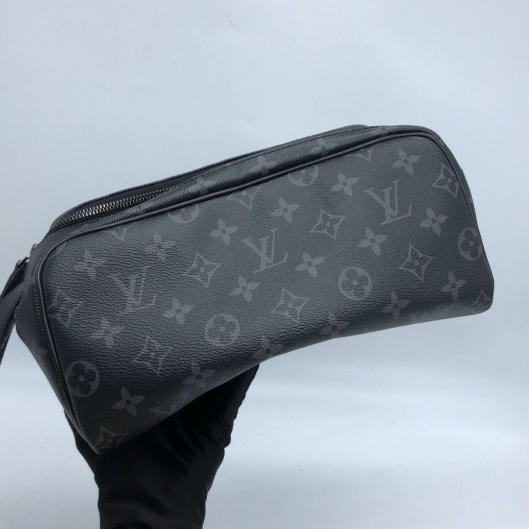 267010068 LOUIS VUITTON BAG MONOGRAM DOPP KIT ECLIPSE CANVAS M46354 (Category: Luxury Bags & Wallets) located in Taguig. Submitted by ecoring.ph (Listing ID 1468578493, Image 1). Description: ◆CONDITION: B+ ◆DESCRIPTIONS: (Other defects/info:) OUTER: The body of the pouch is slightly scratched and deformed, has press marks, and shows signs of use. The bottom and bottom corners of the pouch are slightly scuffed. The top handle and zipper puller of