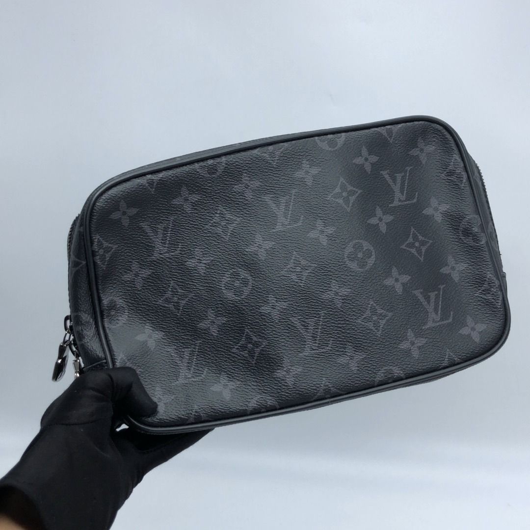 267010069 LOUIS VUITTON BAG MONOGRAM ECLIPSE MONOGRAM ECLIPSE TOILETRY TROUSE POUCH GM M43383 RFID (Category: Luxury Bags & Wallets) located in Taguig. Submitted by ecoring.ph (Listing ID 1468582772, Image 1). Description: ◆CONDITION: B+ ◆DESCRIPTIONS: (Other defects/info:) OUTER: The hardware of the clutch is scratched, tarnished, and faded, has minimal dents, and shows signs of use. INNER: The body of the pouch is slightly scratched, wrinkled, 