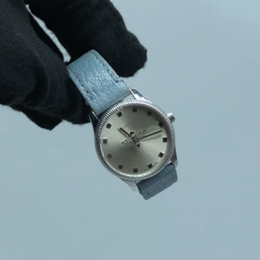 267010128 GUCCI WATCH 126.5 (Category: Luxury Watches) located in Taguig. Submitted by ecoring.ph (Listing ID 1468589741, Image 1). Description: ◆CONDITION: B ◆DESCRIPTIONS: (Other defects/info:) The bezel, case back, end pieces, crown, and buckle of the watch are slightly scratched, have minimal dirt, and show signs of use. The strap of the watch is slightly scratched and scuffed, has wrinkles and press marks, and shows signs of use. The rubber 
