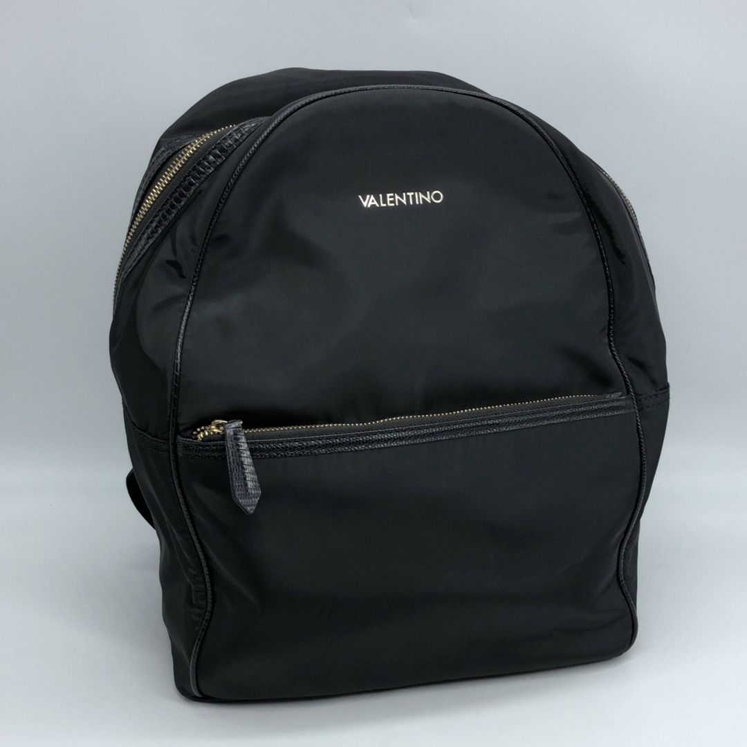 267010180 VALENTINO BAG NYLON MARIO BACKPACK (Category: Luxury Bags & Wallets) located in Taguig. Submitted by ecoring.ph (Listing ID 1468584664, Image 1). Description: ◆CONDITION: B ◆DESCRIPTIONS: (Other defects/info:) OUTER: The body of the bag is stained and dirty, and shows signs of use. The bottom and bottom corners of the bag are scratched, scuffed, stained, dirty, wrinkled, deformed, slightly peeled off, and chipped, have press marks, and 