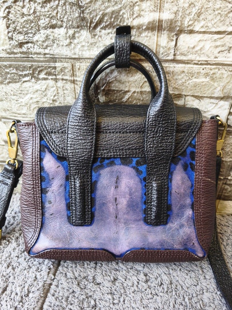 SALE‼️3.1 Philip Pashli Mini Satchel Two Way Bag (Category: Luxury Bags & Wallets) located in Taytay. Submitted by rgun28 (Listing ID 1468563626, Image 3). Description: 🍀 3.1 Philip Lim Pashli Bag🍀 💯% guaranteed original 𝐂𝐨𝐧𝐝𝐢𝐭𝐢𝐨𝐧: In good used condition/ Rank AB. Flaw at the back peeling of fur.. See photos to appreciate.. Money back guaranteed if proven fake by Entrupy. As is where is..NO RETURN!! NO EXCHANGE!! 🔸Before purchasing, 