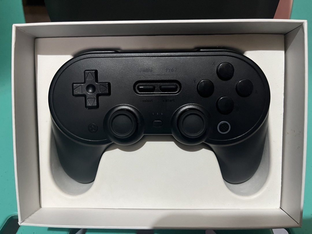 8BitDo Pro 2 Bluetooth Gamepad (Category: Controllers) located in Alaminos. Submitted by desgd (Listing ID 1468543662, Image 2). Description: - Item: 8BitDo Pro 2 Bluetooth Gamepad - Color: Classic Black - Condition: Like new, barely used - Compatibility: Nintendo Switch, Windows PC, Android, Apple devices, and Steam Deck - Key Feature: Upgraded Hall Effect joysticks for zero drift and precise control - Inclusions: Original box, USB charging cabl