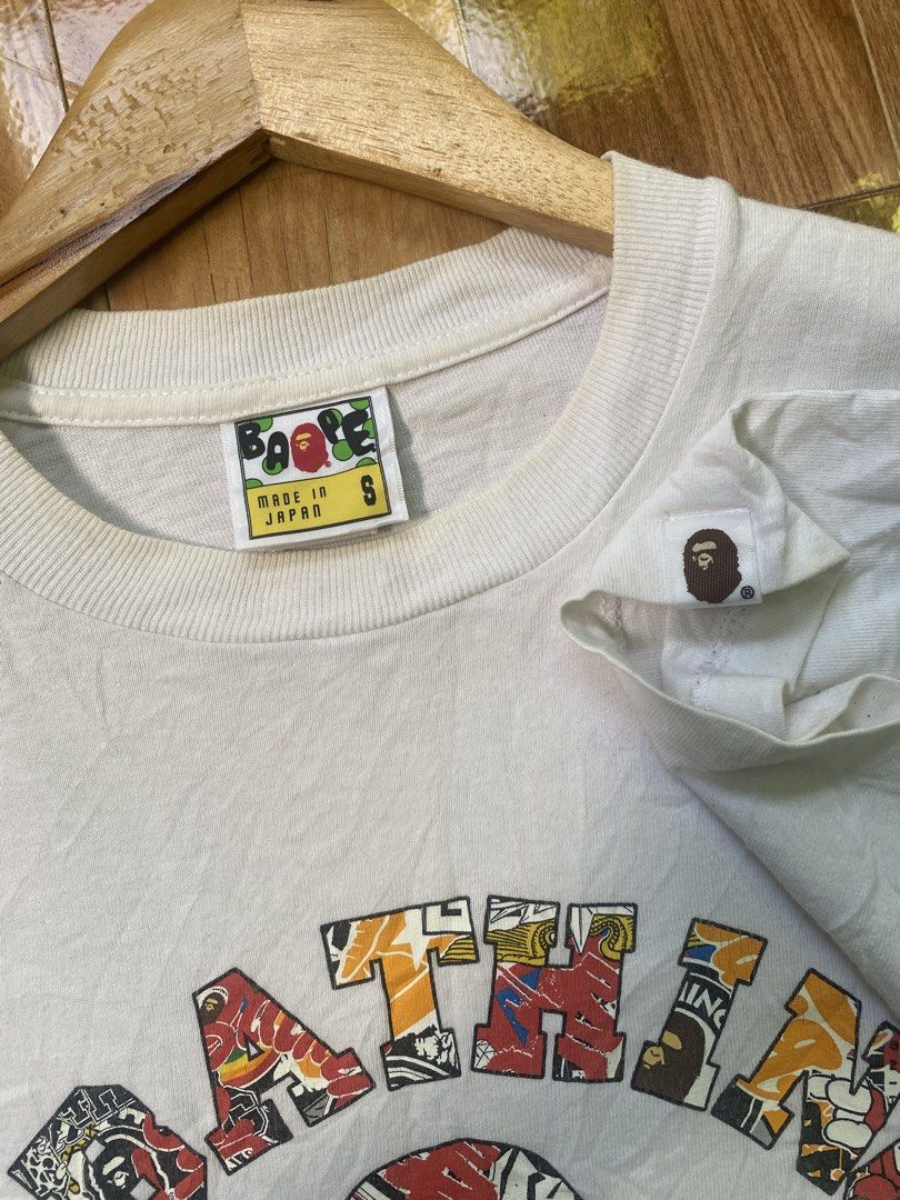 A Bathing Ape (BAPE) Multi-Logo College Tee.🏷️ (Category: Tshirts & Polo Shirts ) located in Binalbagan. Submitted by johncarlocaalim (Listing ID 1468508258, Image 3). Description: Legit|Authentic Dimes 19x26 Good condition Color rate 9/10 Issue hairline and need wash .