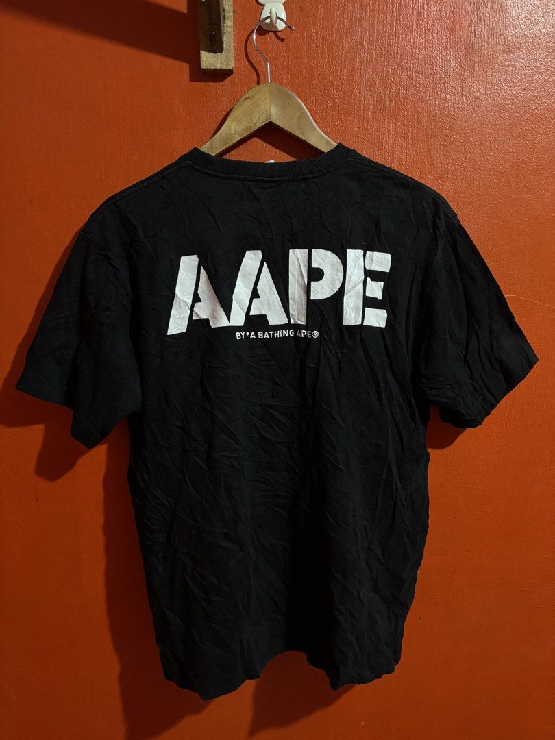 AAPE By A Bathing Ape Black T-Shirt (Category: Tshirts & Polo Shirts ) located in Naga. Submitted by ajrc.shop (Listing ID 1468521008, Image 2). Description: AAPE by A Bathing Ape Black Embossed T-Shirt ✅Size: L ✅Width: 21 ✅Length: 25.5 ✅Color Rate: 9.8/10 ✅Issue: None ✅Need Wash ✅Location: Bicol Naga City, Camarines Sur ✅Courier: J&T Express/Flash Express ✅MOP: Gcash only.